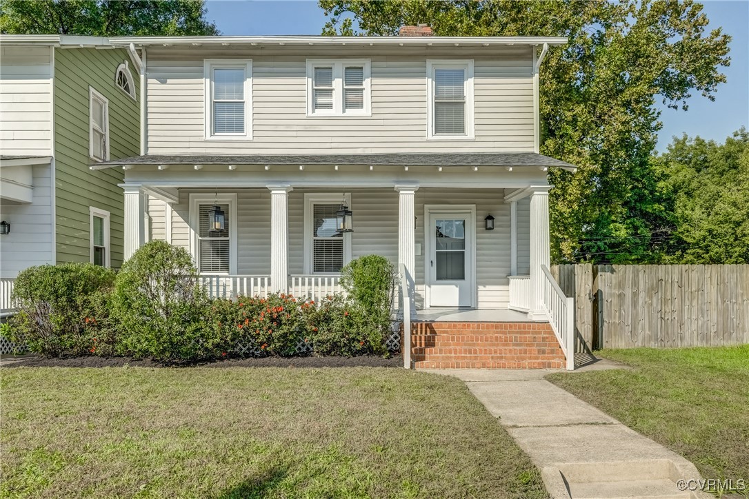 front view of a house with a yard