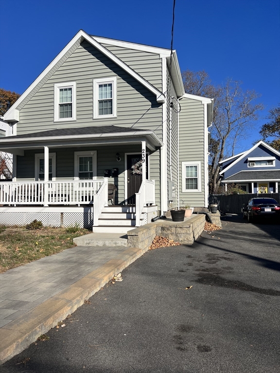 a front view of a house with a garage