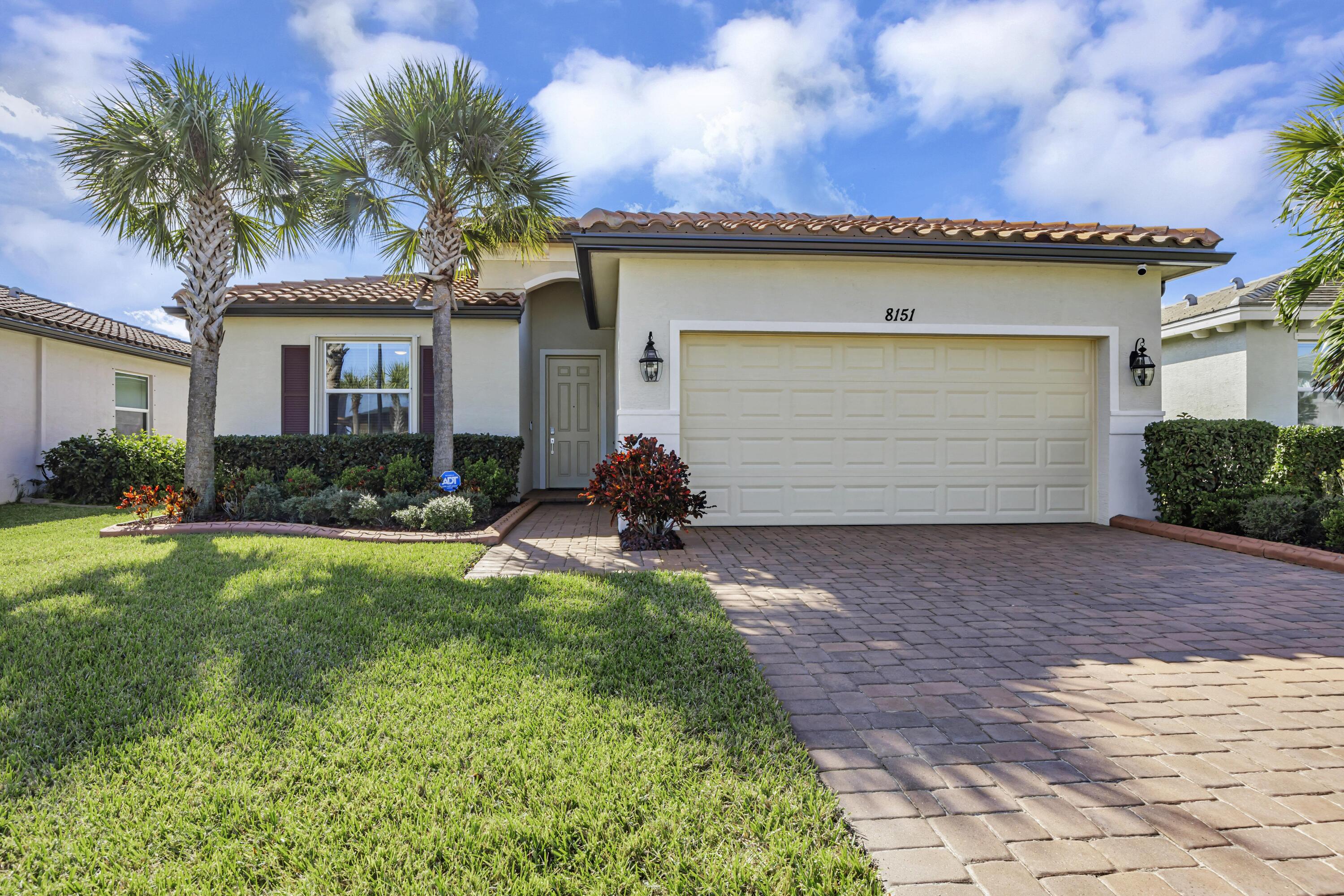 a front view of house with yard