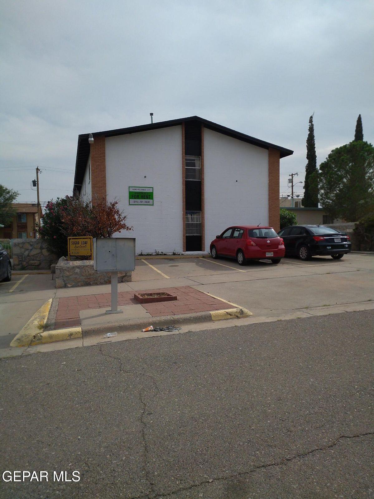 a car parked in front of a house