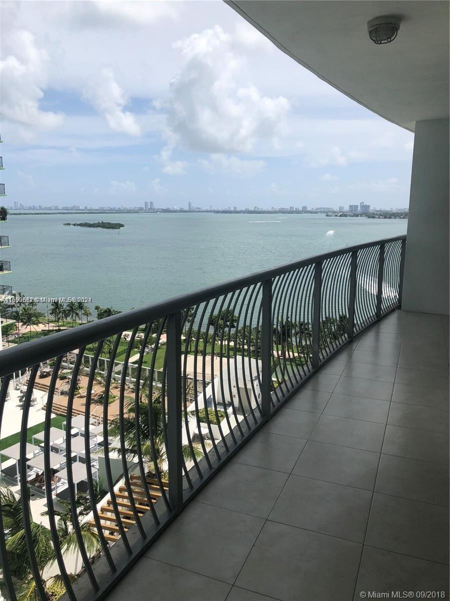 a balcony with an ocean view