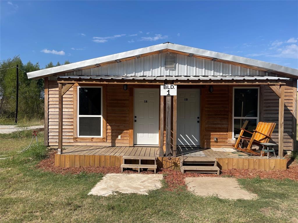 a front view of a house with patio