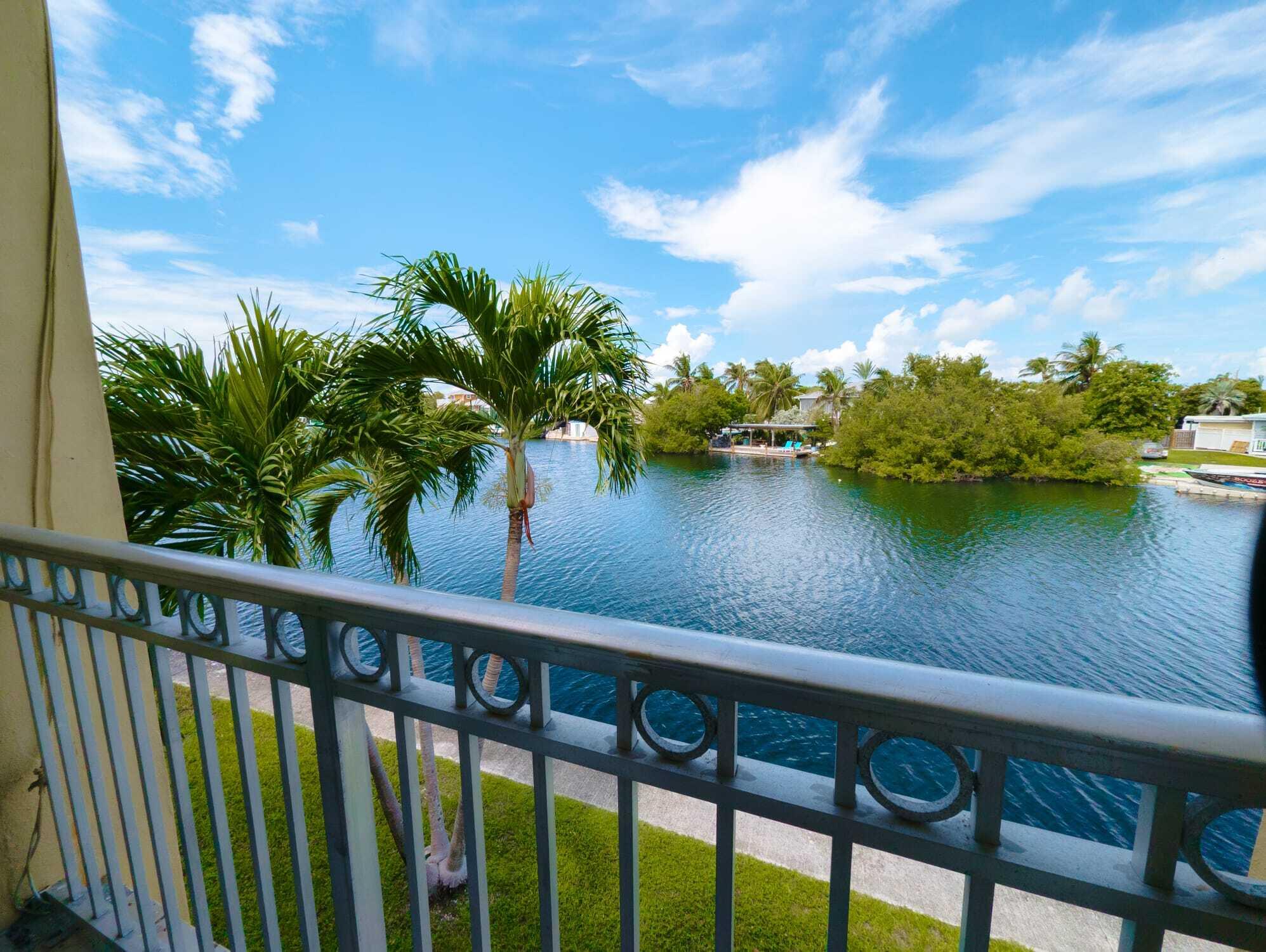 a view of a lake from a balcony