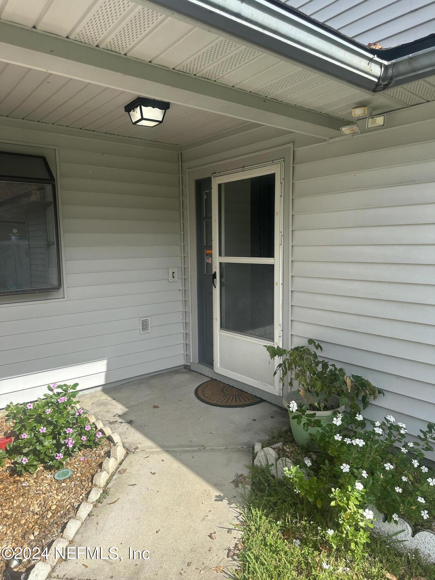 a view of a entrance door of the house