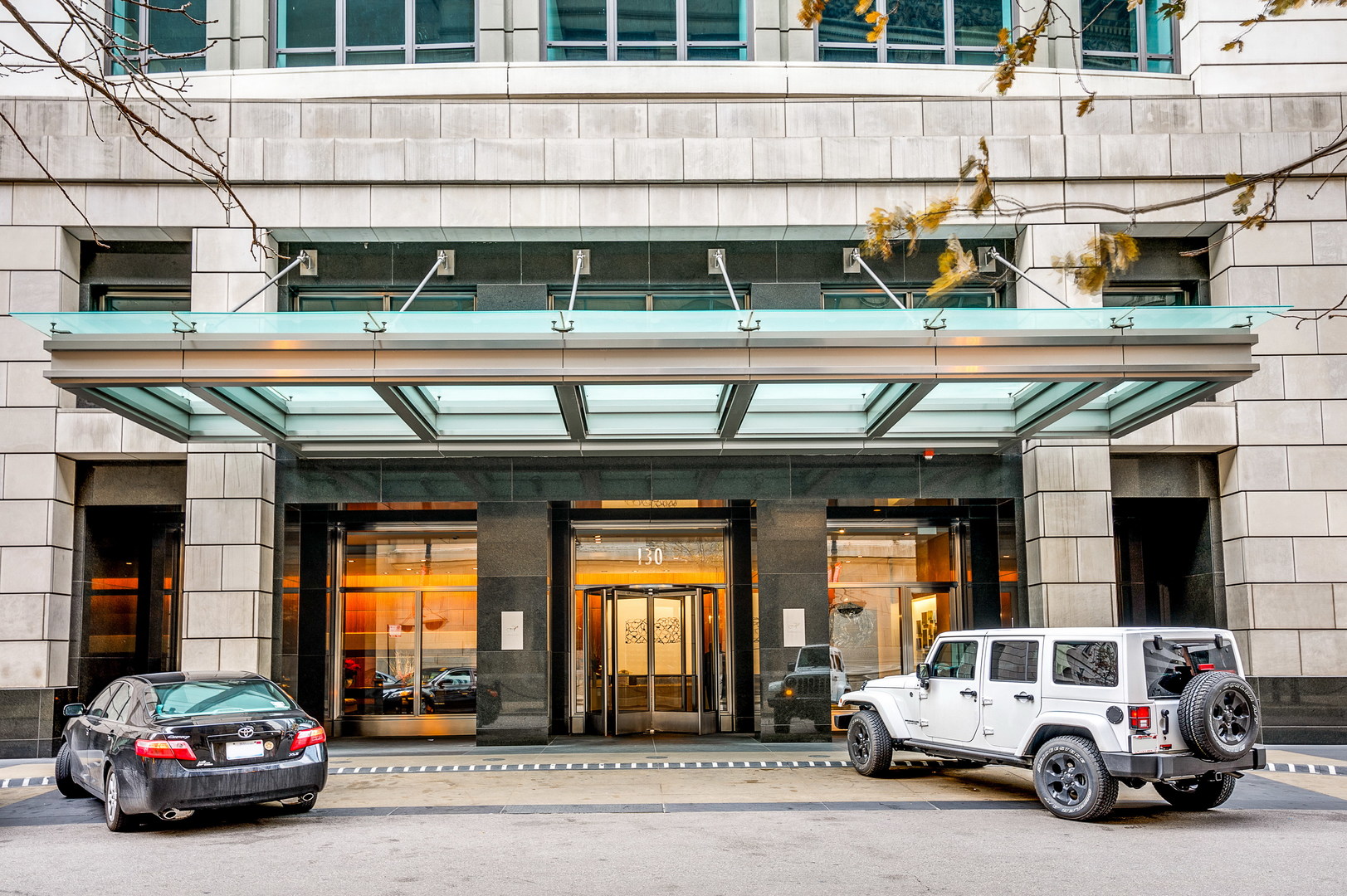 a view of a car parked in front of a building