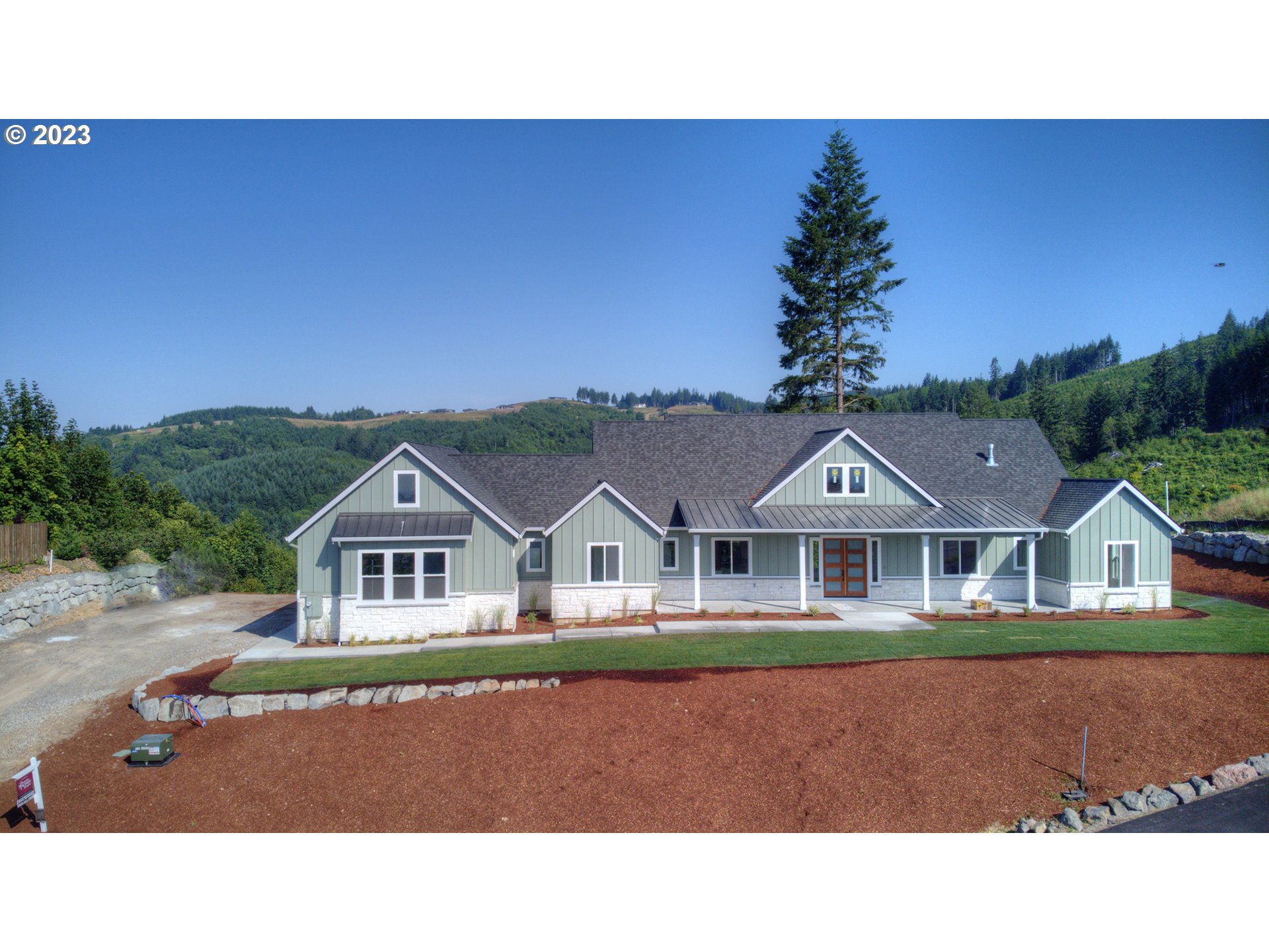 a house view with a garden space