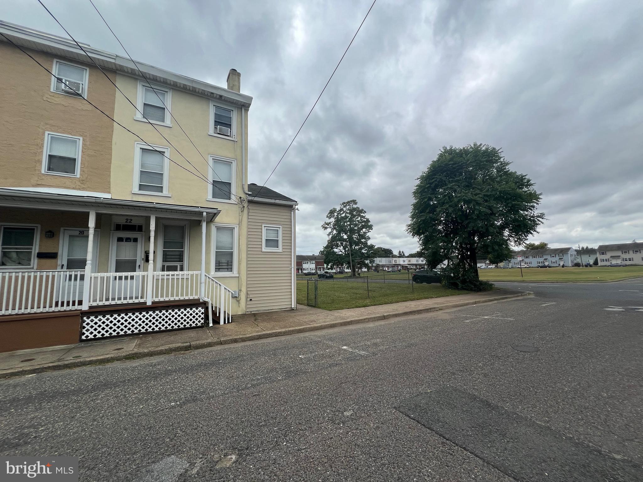 front view of a house with a garden