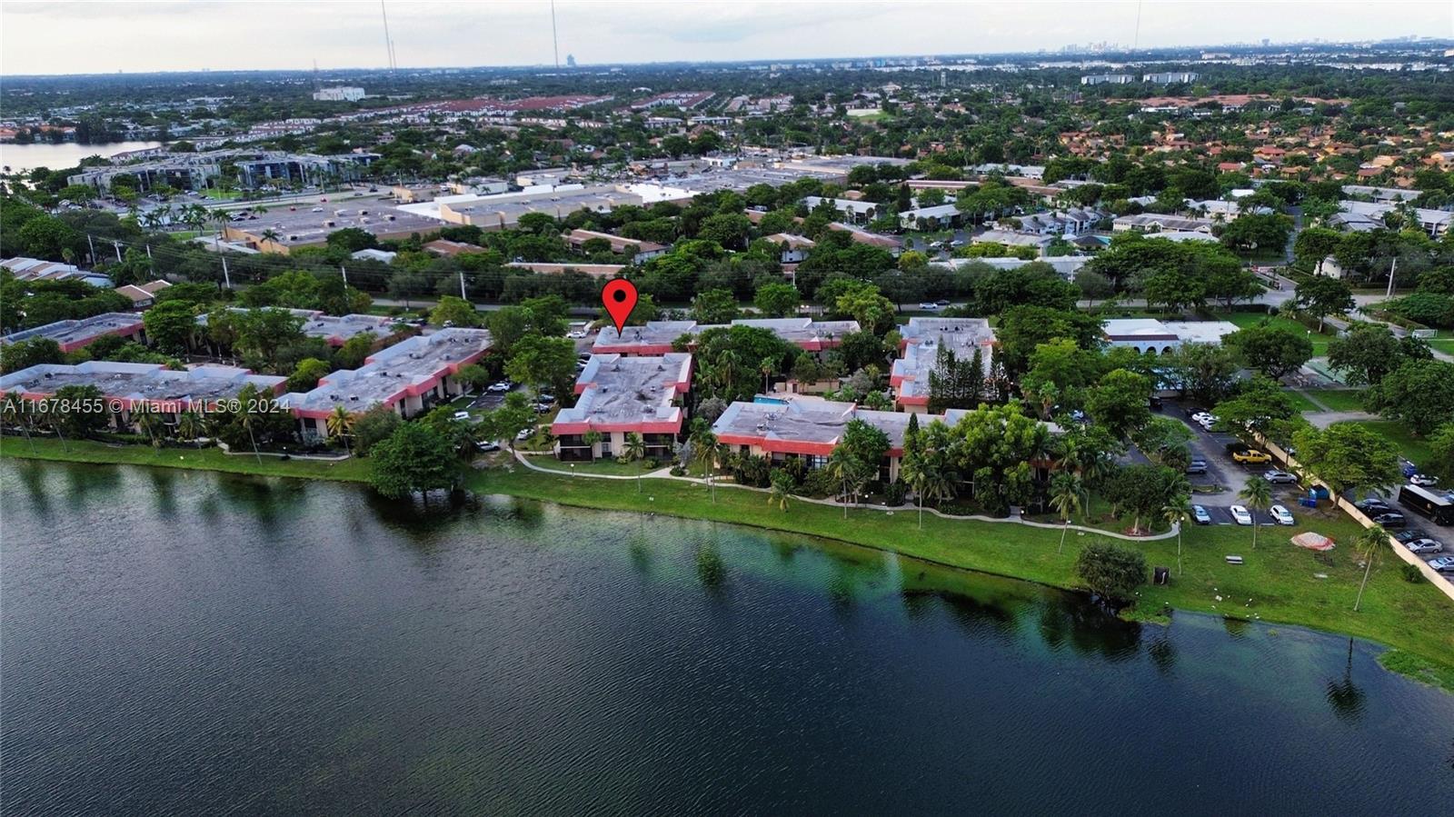 a view of a lake with a city