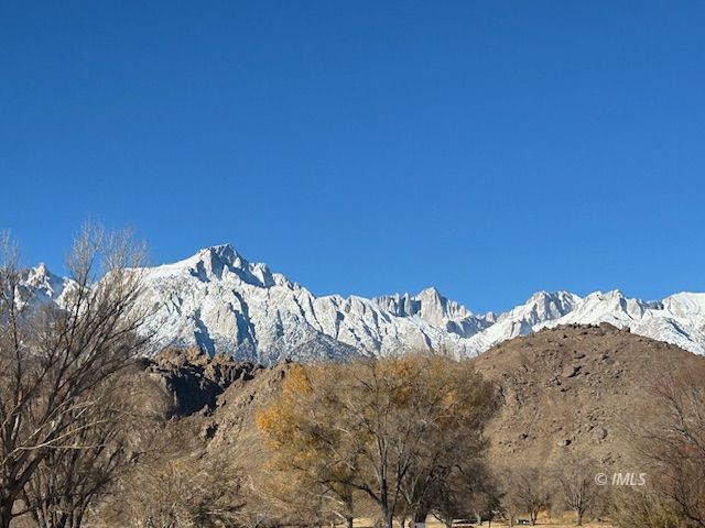 a view of side of snow with side of house