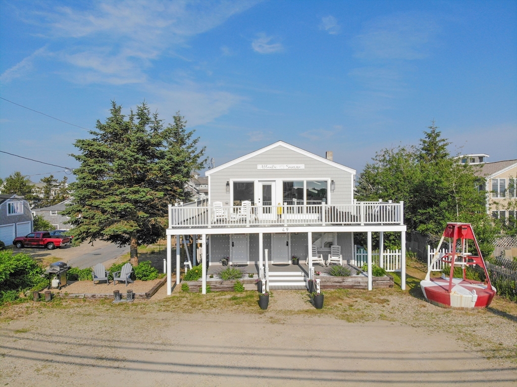 a view of house with outdoor seating