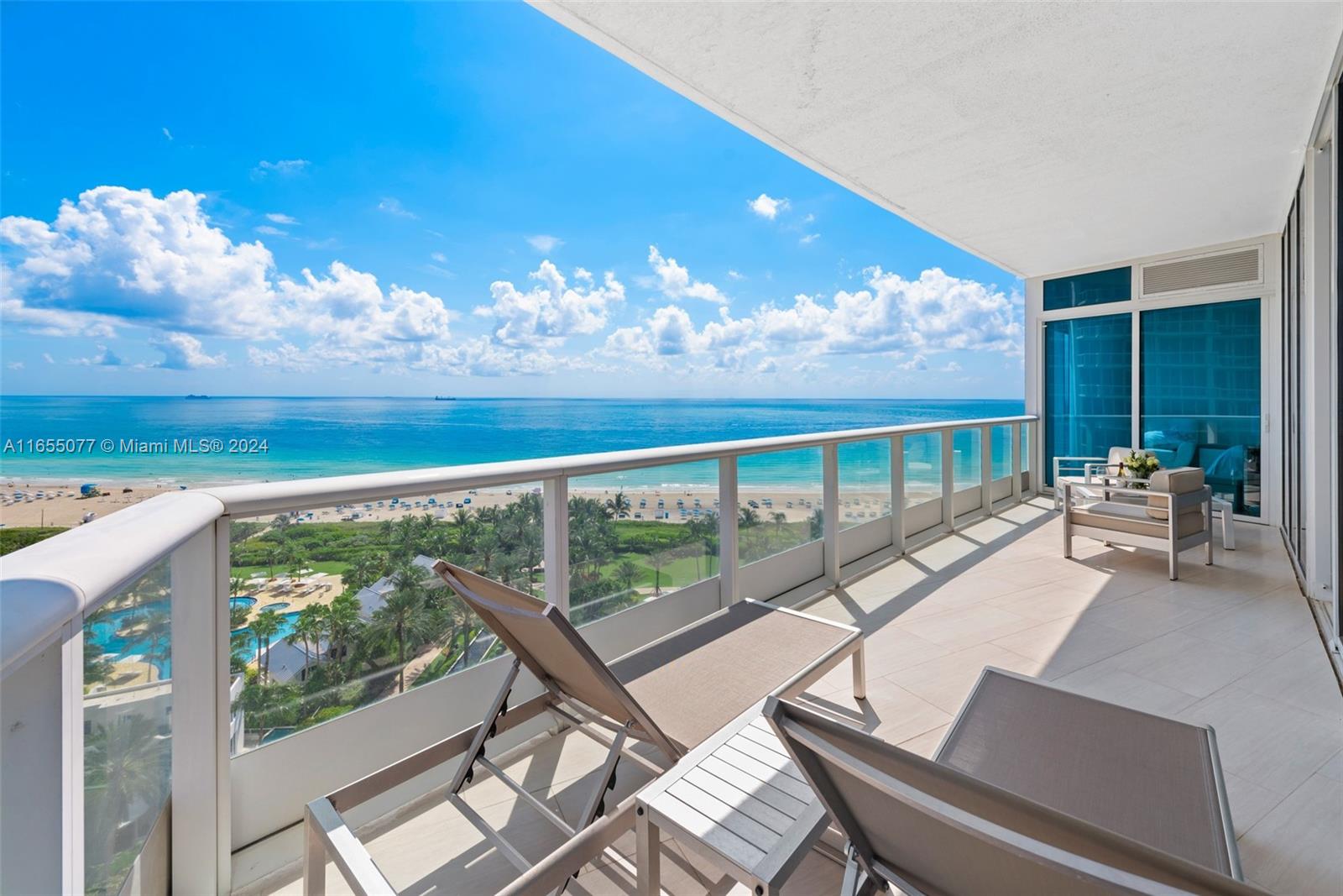 a view of a balcony with chairs