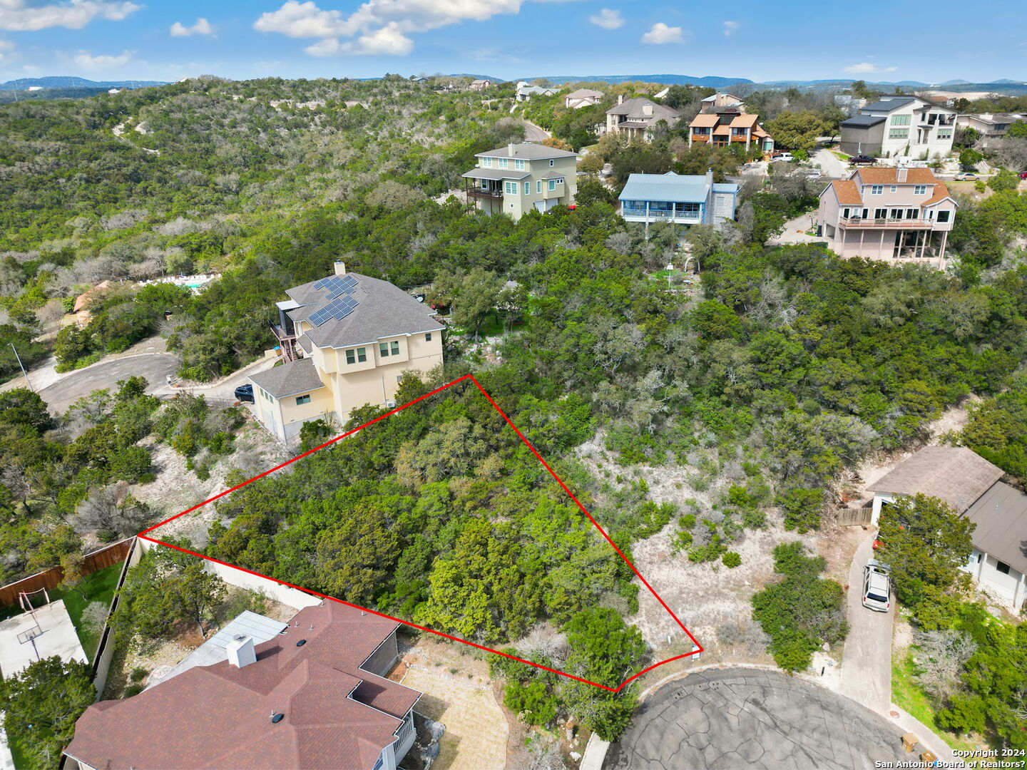 an aerial view of multiple house