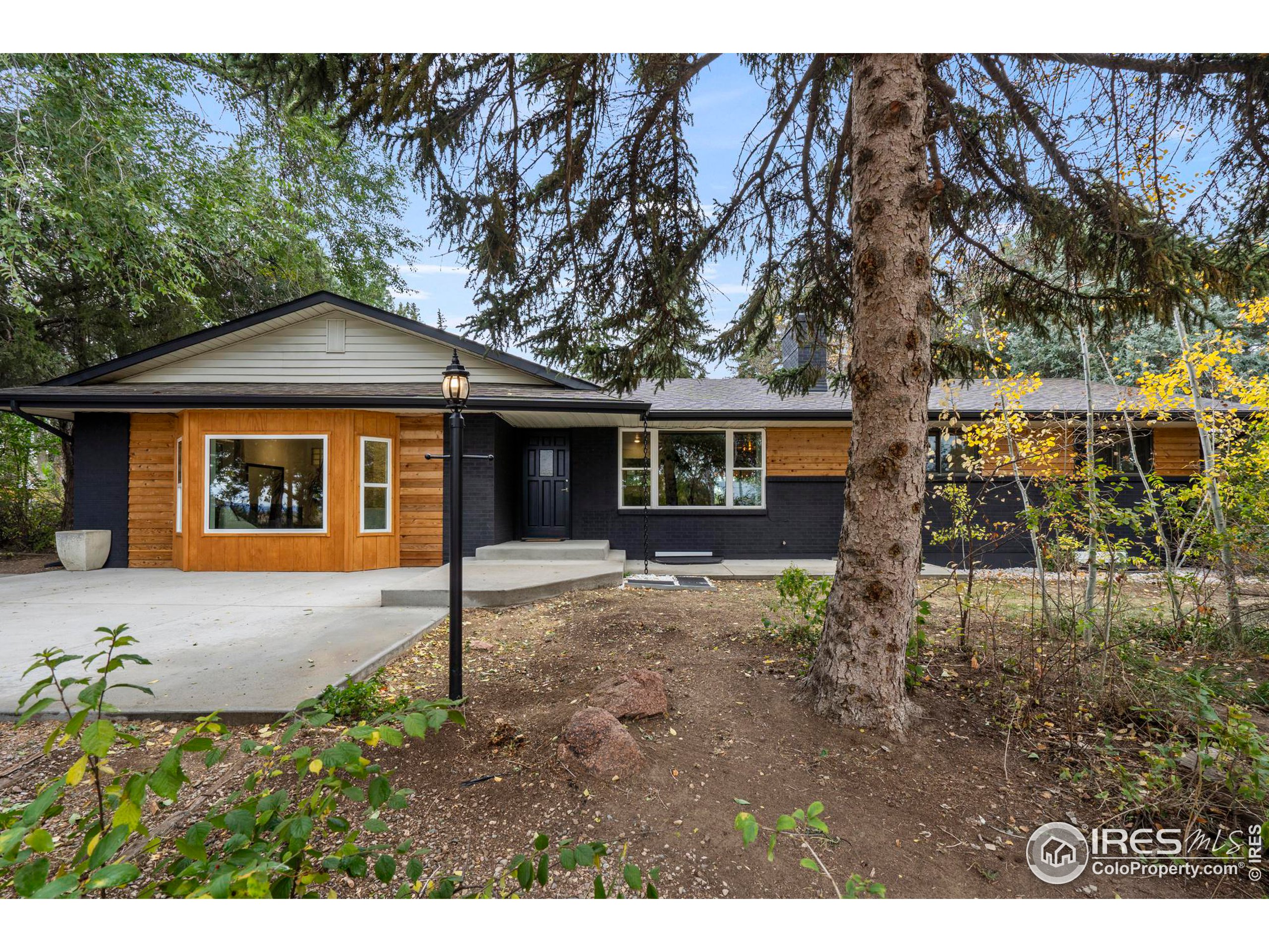 a house with trees in the background