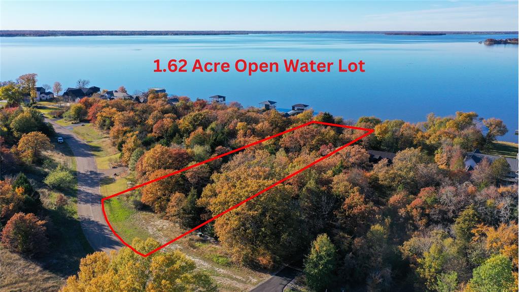 1.62 acre wide open water lot with 161 ft of waterfront.