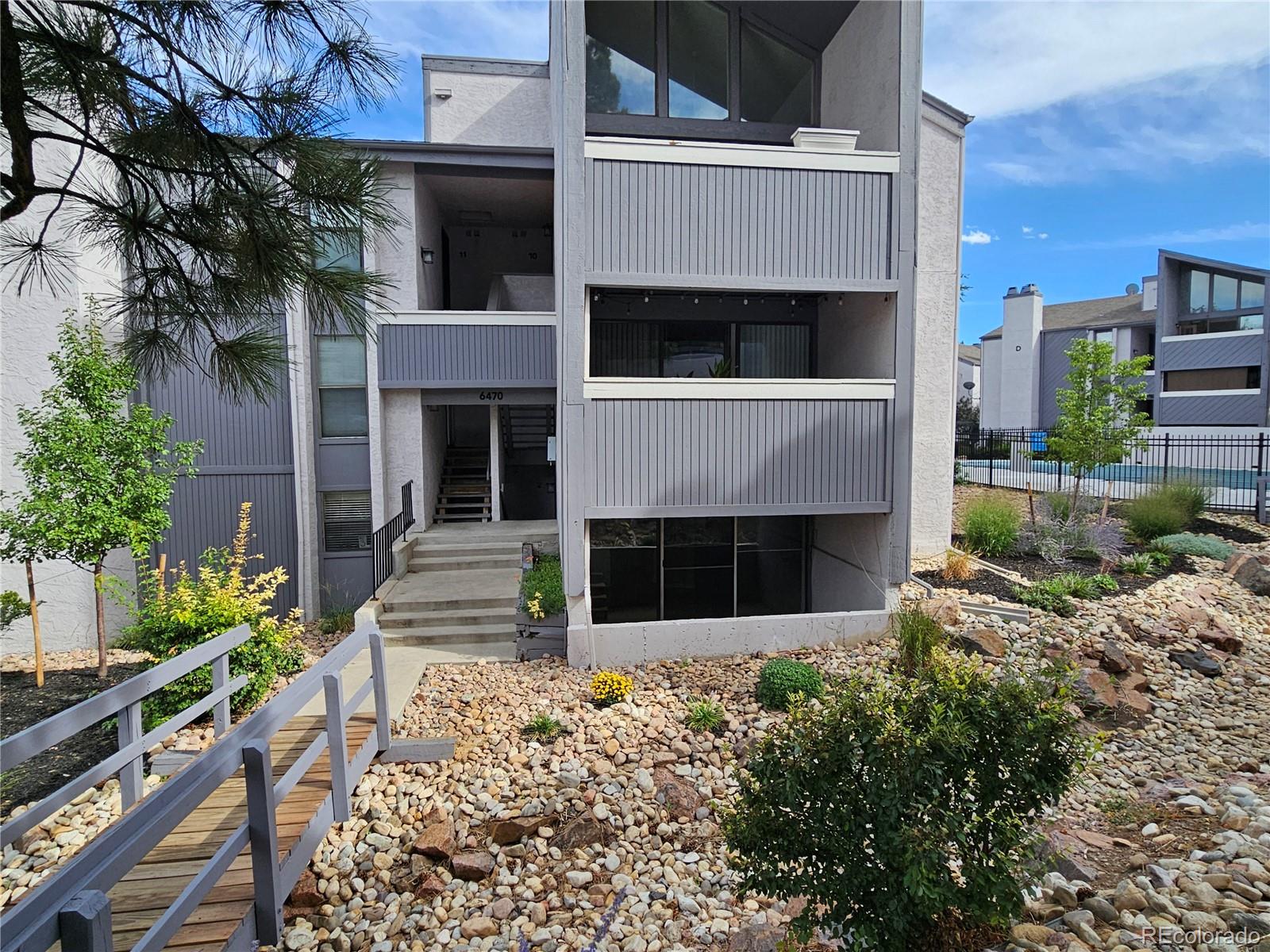 front view of a house with a small yard