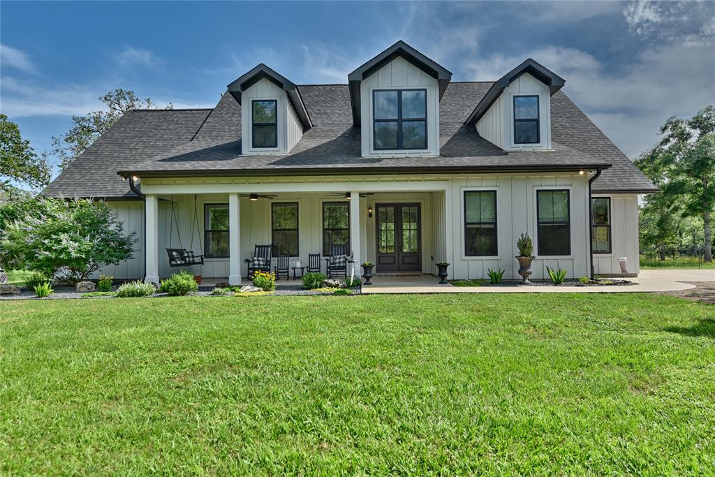 front view of a house with a yard