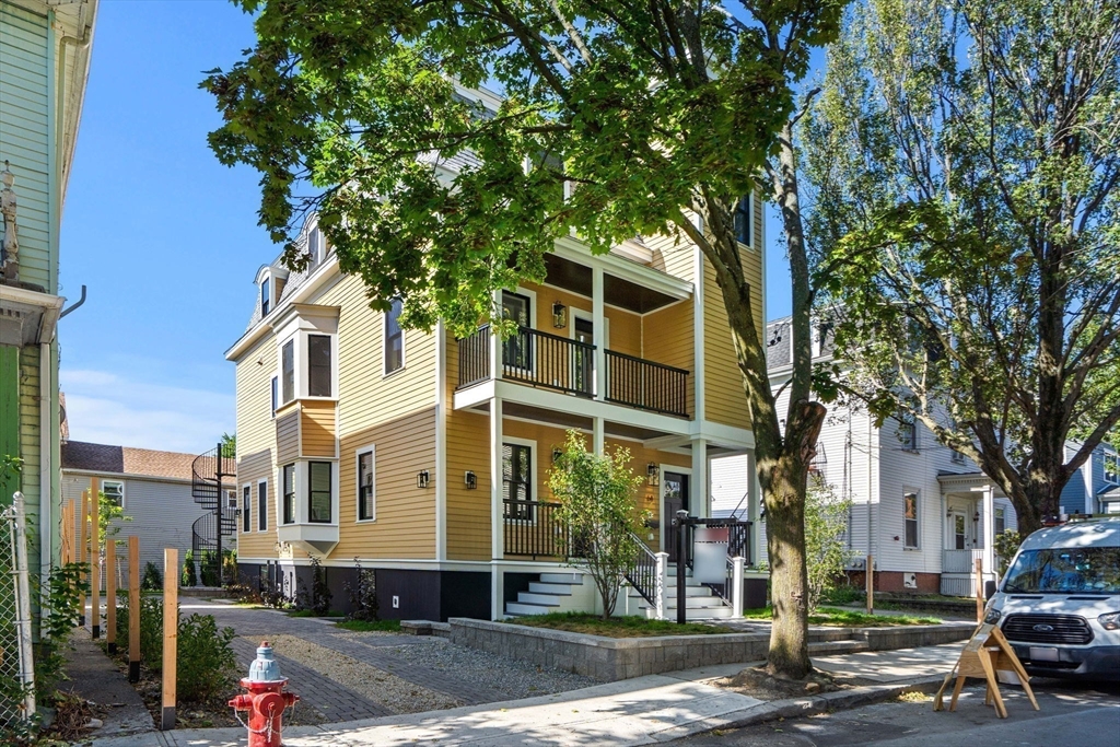 a front view of a building with street view