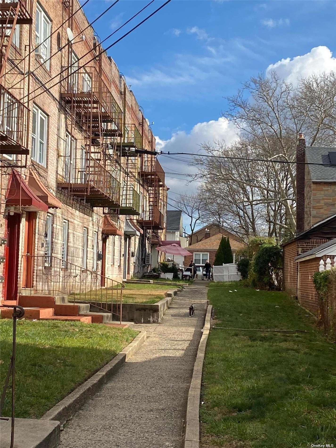 a view of a building with a yard