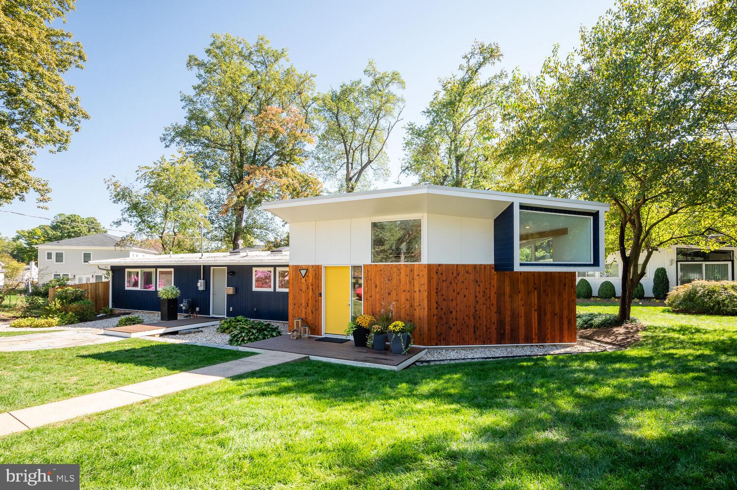 front view of a house with a yard