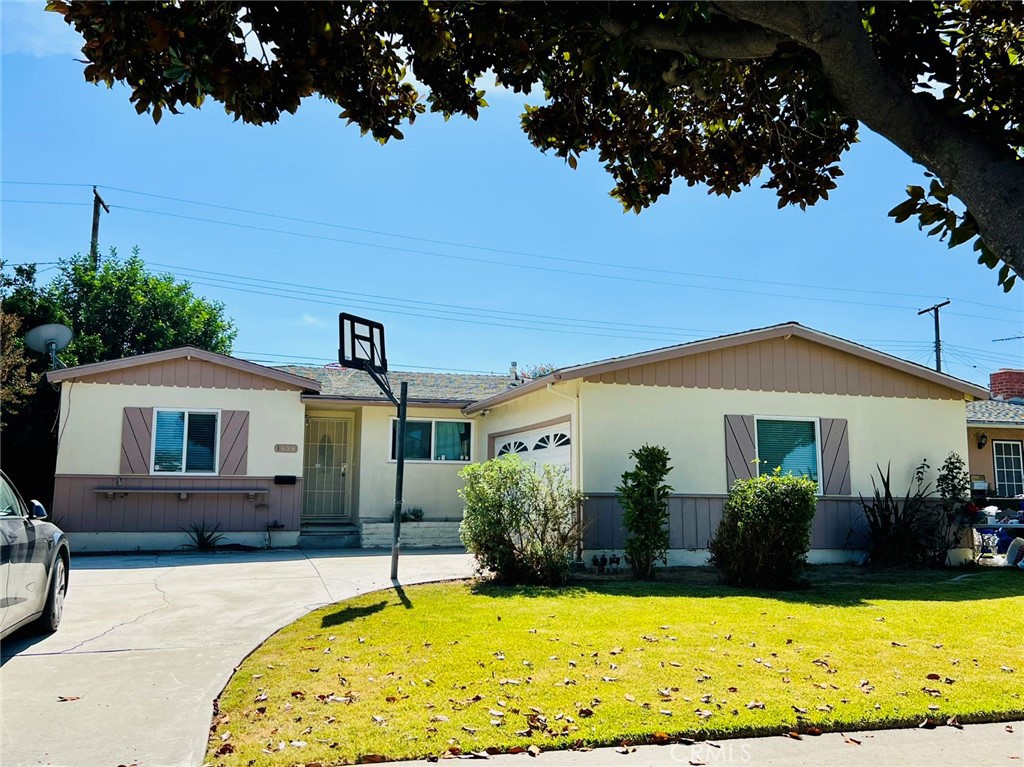 a front view of a house with a swimming pool