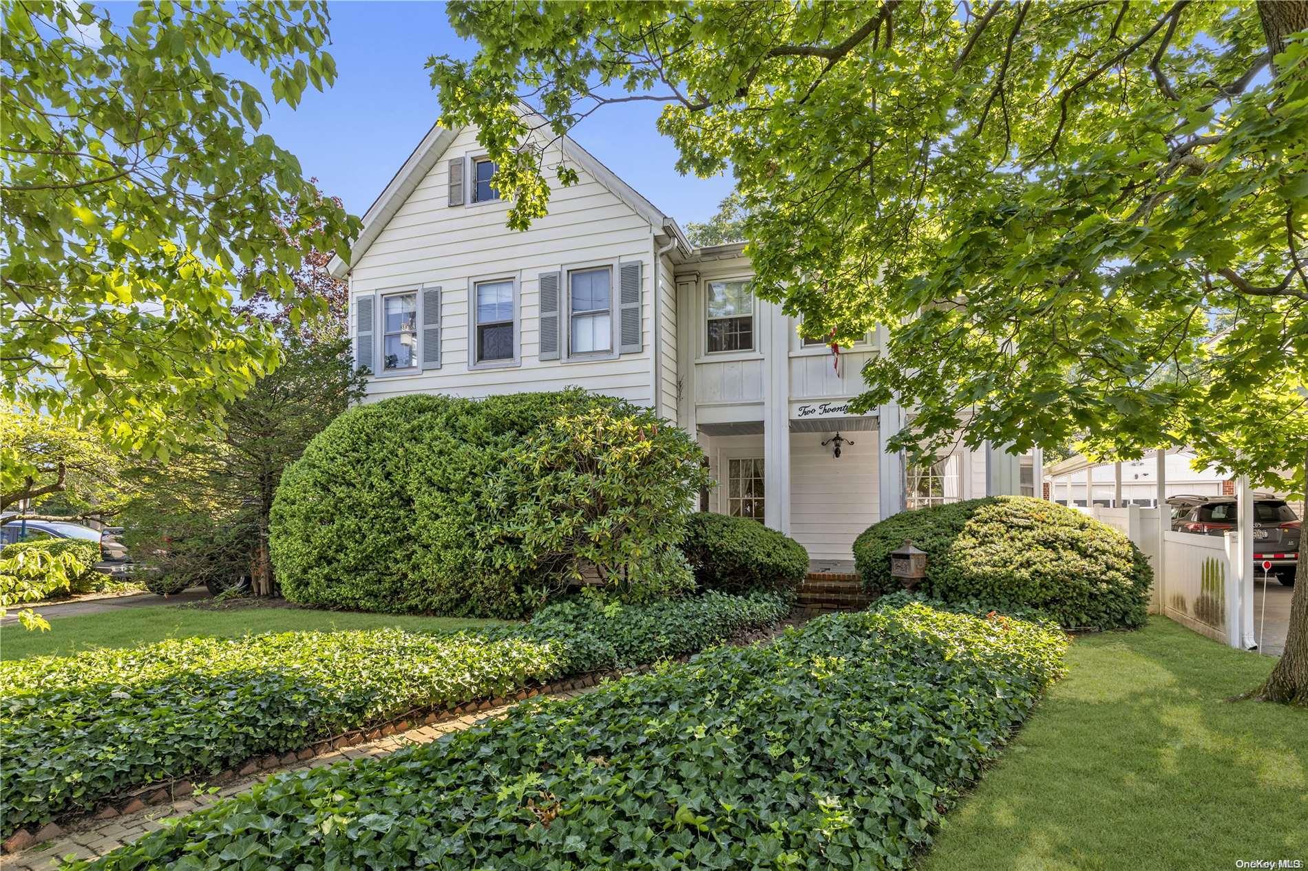 a view of a house with a garden