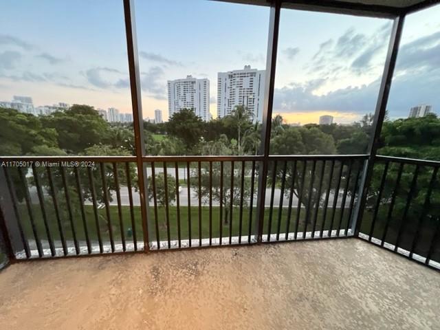 a view of a balcony with city view