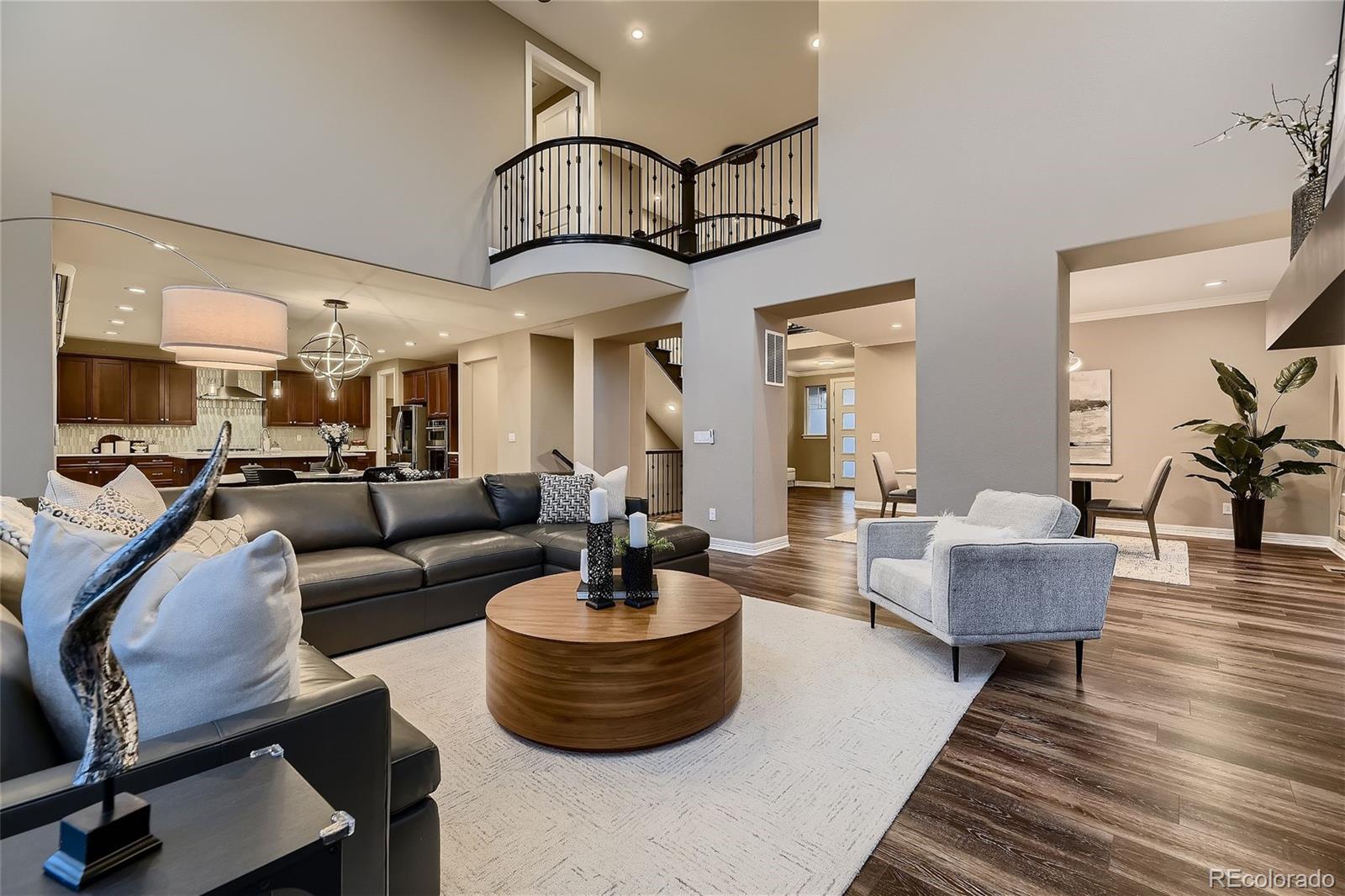 a living room with furniture or couch and a potted plant