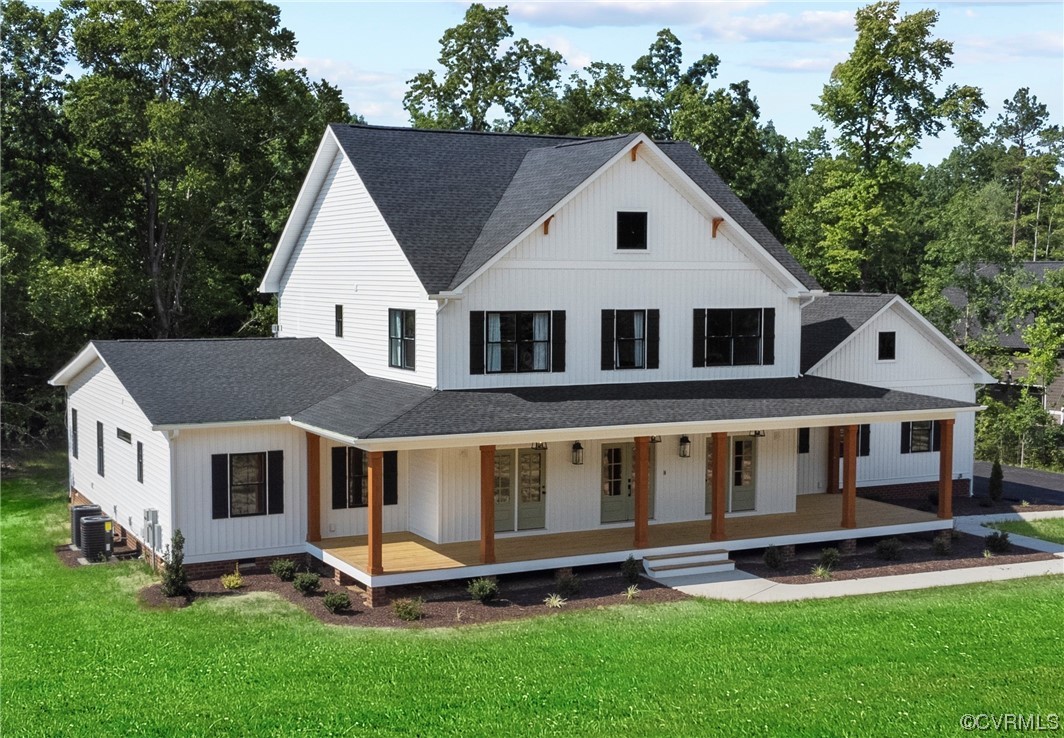 a view of a yard in front of a house with a yard and seating space