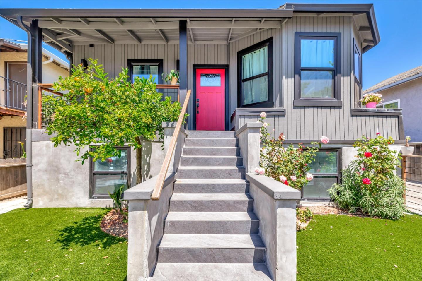 a front view of a house with a yard