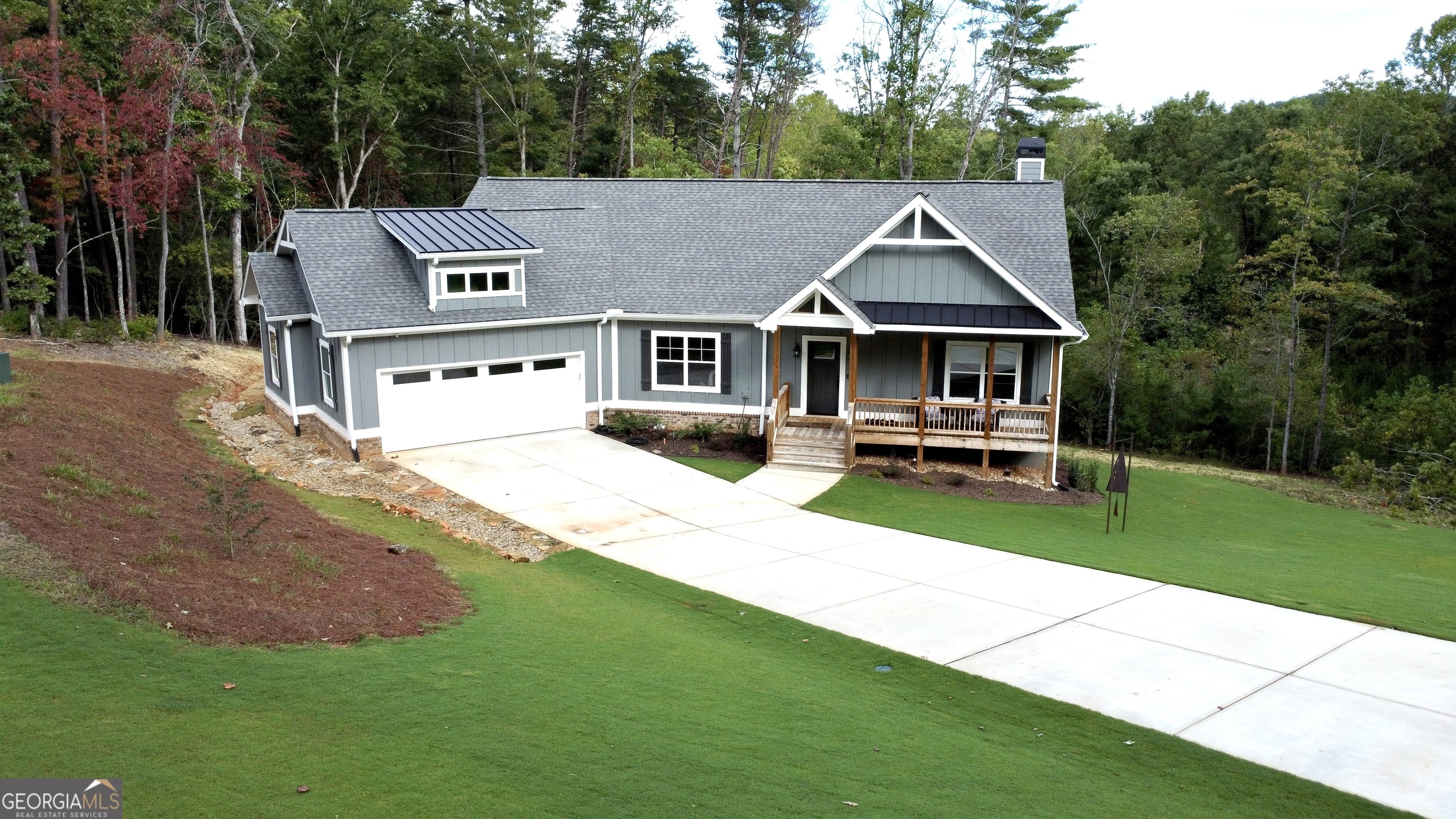 a house with garden in front of it