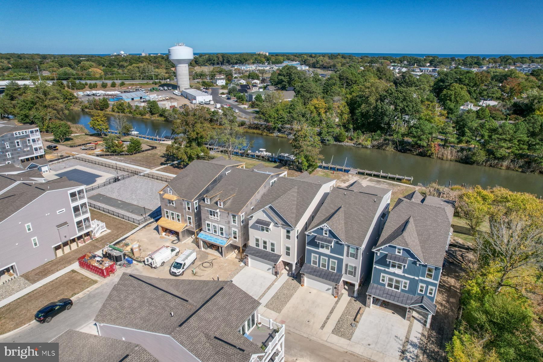 an aerial view of a house with a lake view