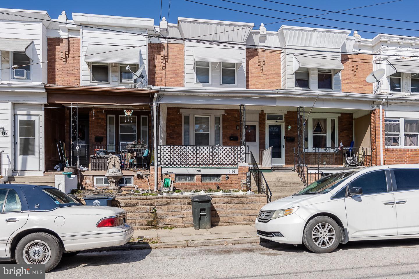 a car parked in front of a house