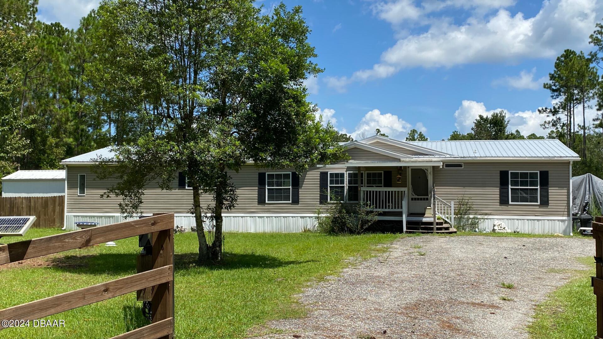 a front view of house with yard