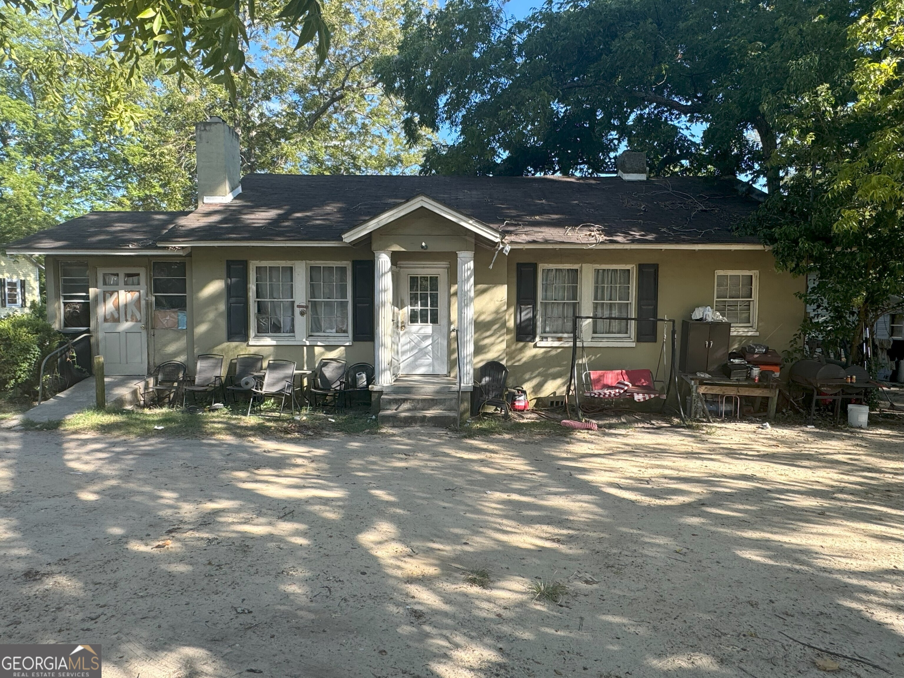 a view of a house with a patio