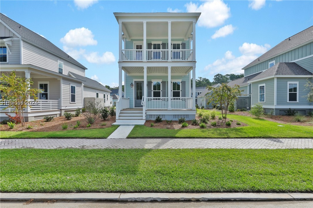 Double front porches beckon relaxation!