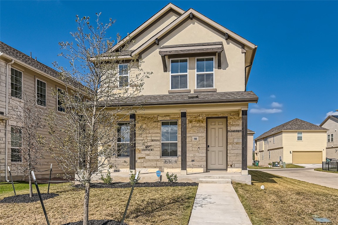 Meticulously maintained two-story contemporary home on a premium corner lot in Dripping Springs Big Sky Ranch community.