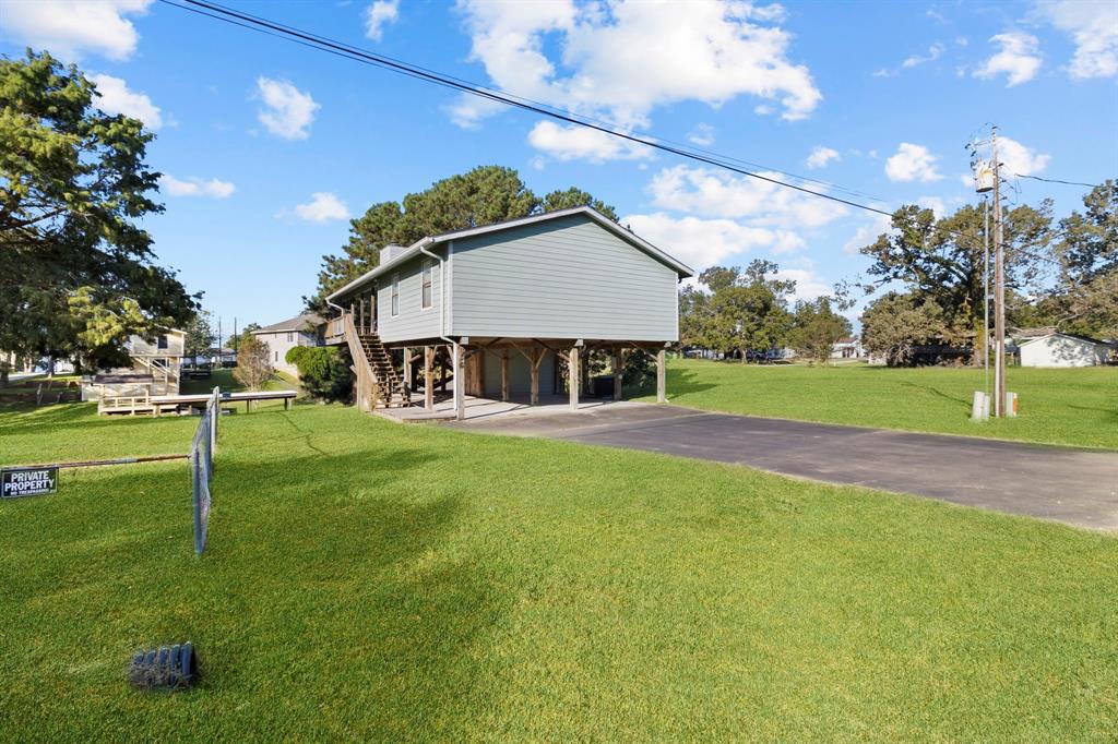 a view of a house with a big yard