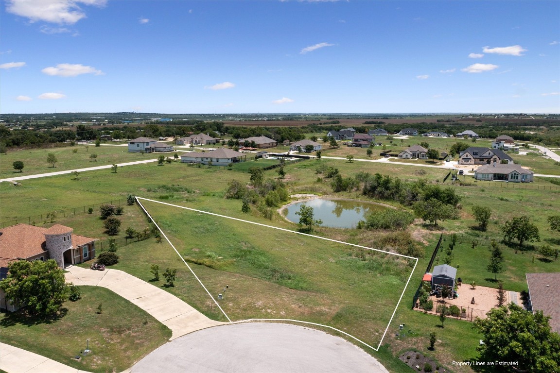 an aerial view of a houses with outdoor space