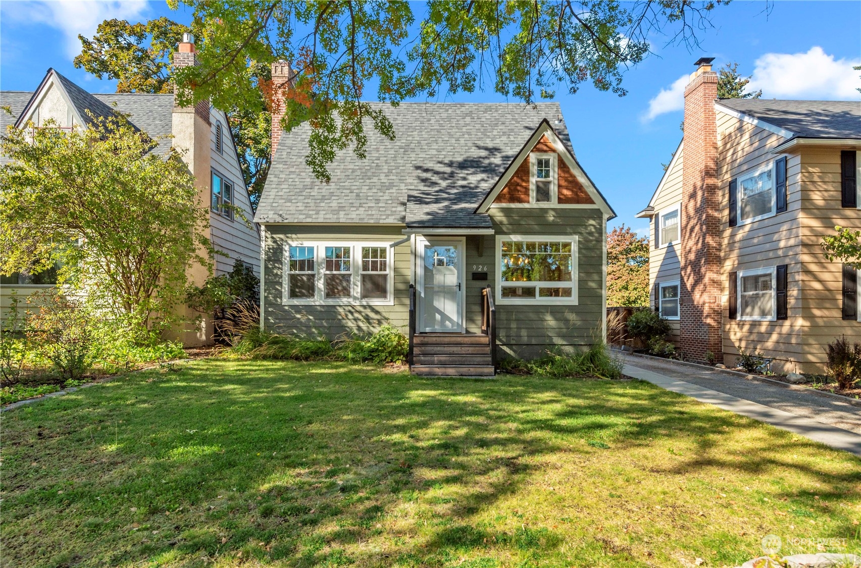 a view of house with yard