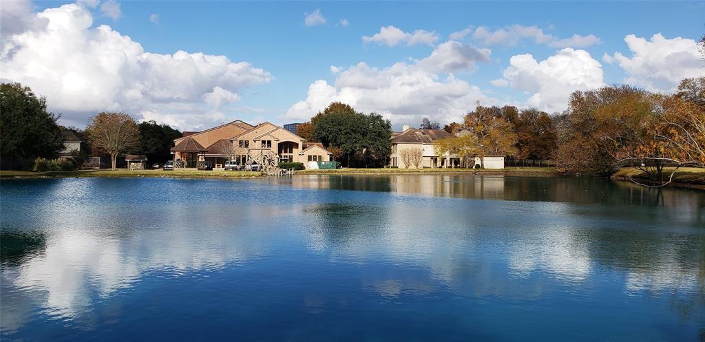 a view of a lake with houses