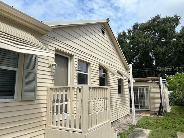 a view of a house with a small porch