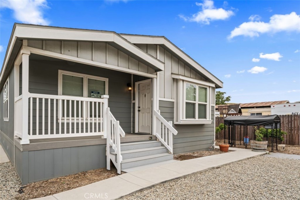 a front view of a house with a porch