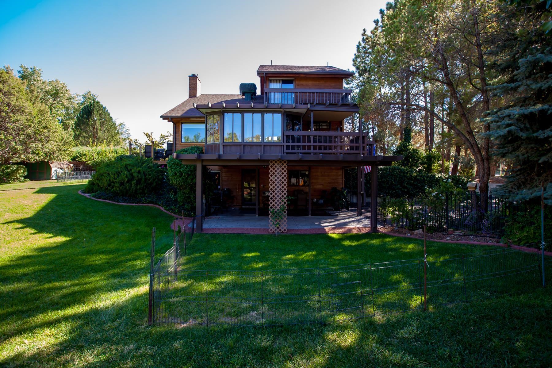 a view of a house with a yard porch and sitting area