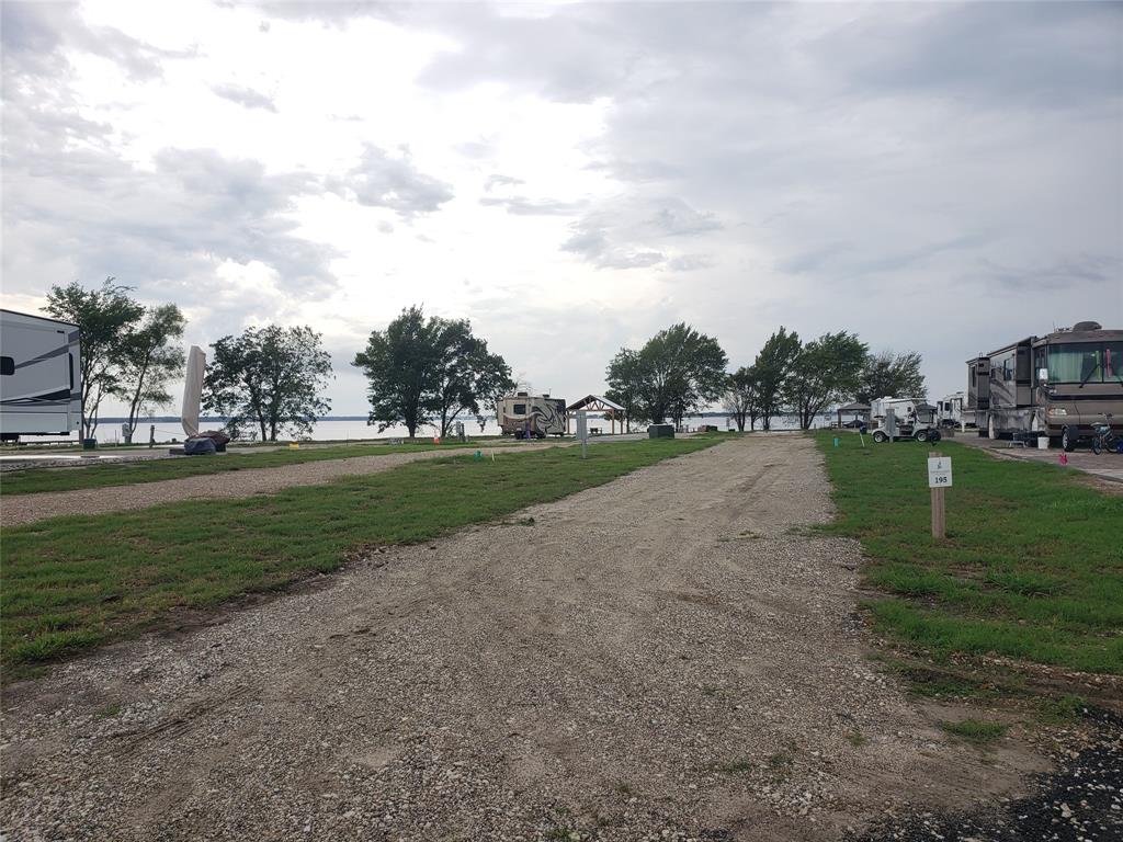 a view of a lake with a big yard