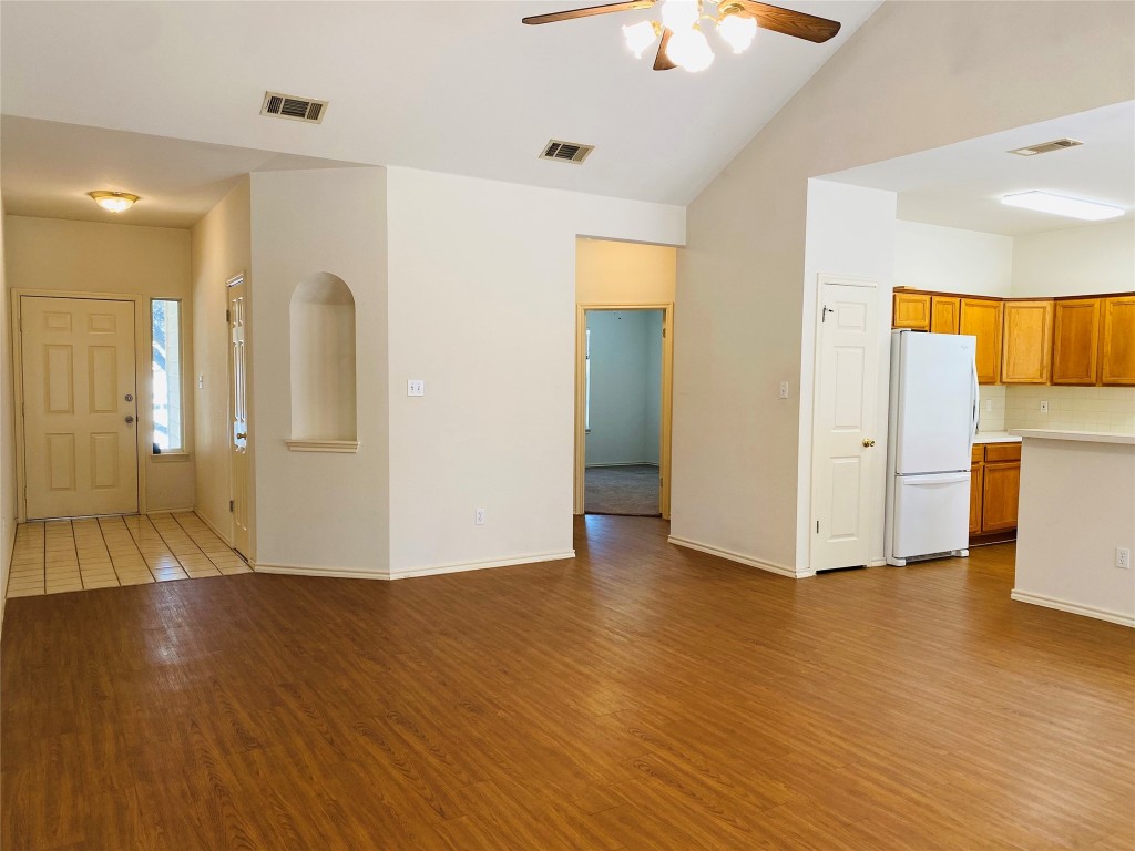 a view of a livingroom with wooden floor