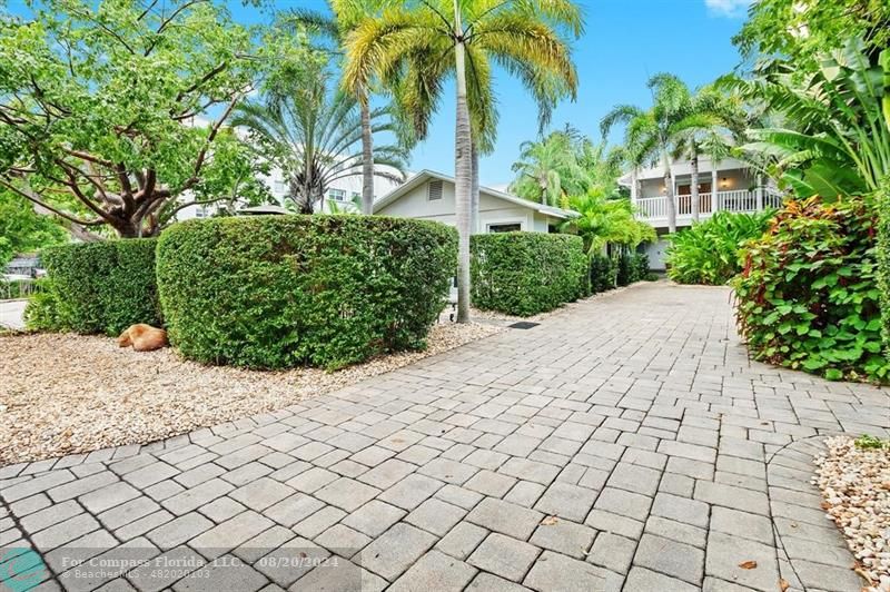 a view of a backyard of a house