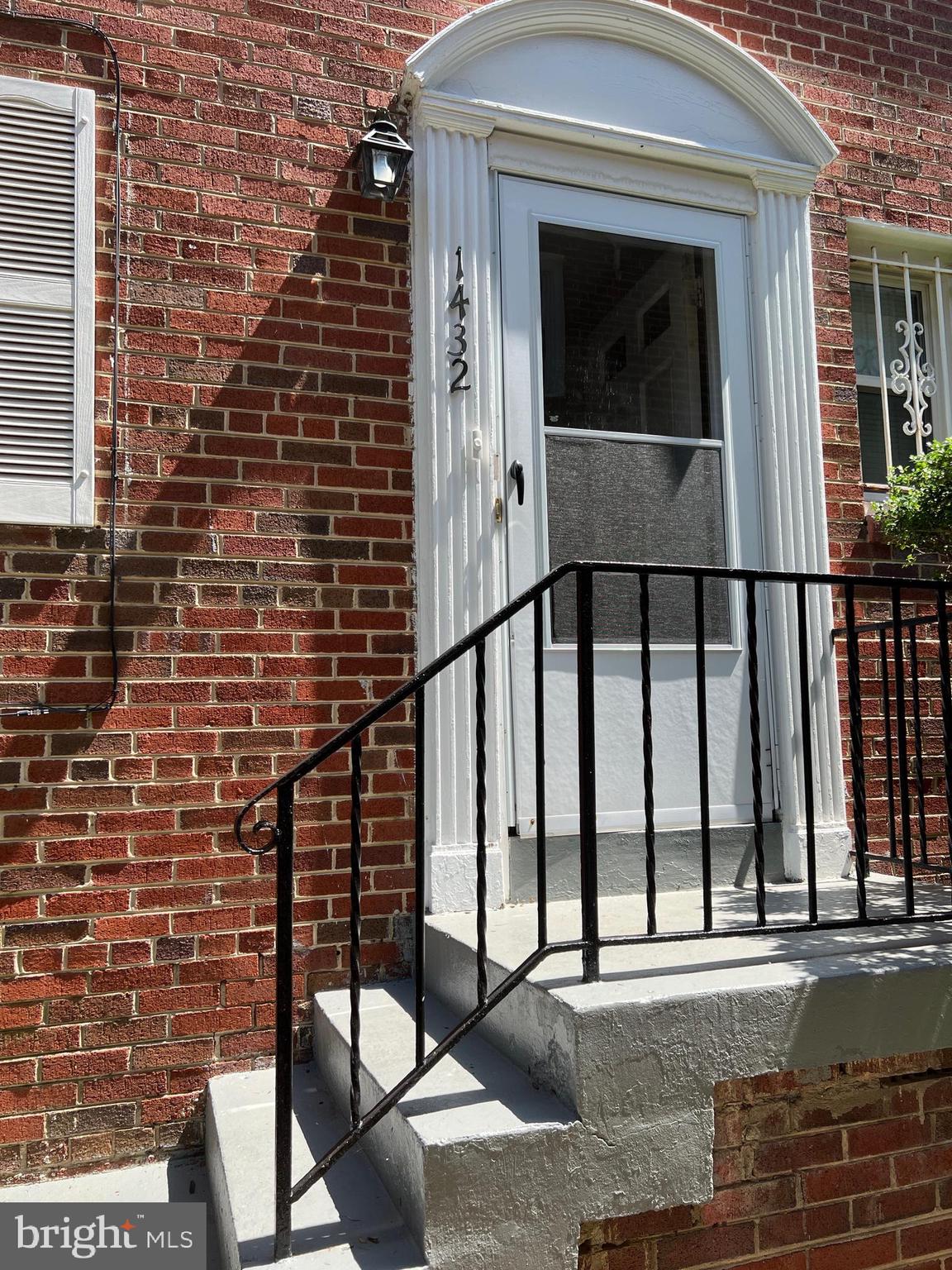 a view of a balcony with a door