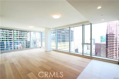 a view of an empty room with a balcony