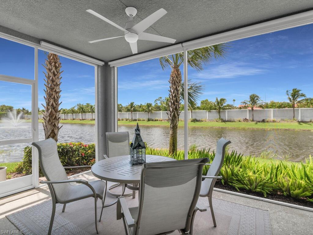 a view of a chairs and table in patio