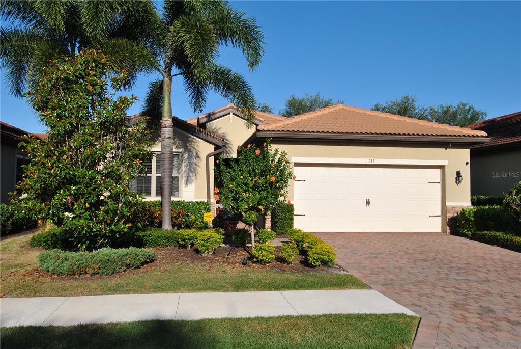 a front view of house with yard